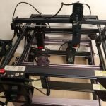 A pile of Atomstack laser engravers
