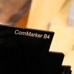ComMarker B4 white engraving on black acrylic