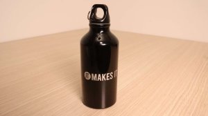 Steel bottle engraved with the xTool F1 using the xTool RA2 pro rotary attachment